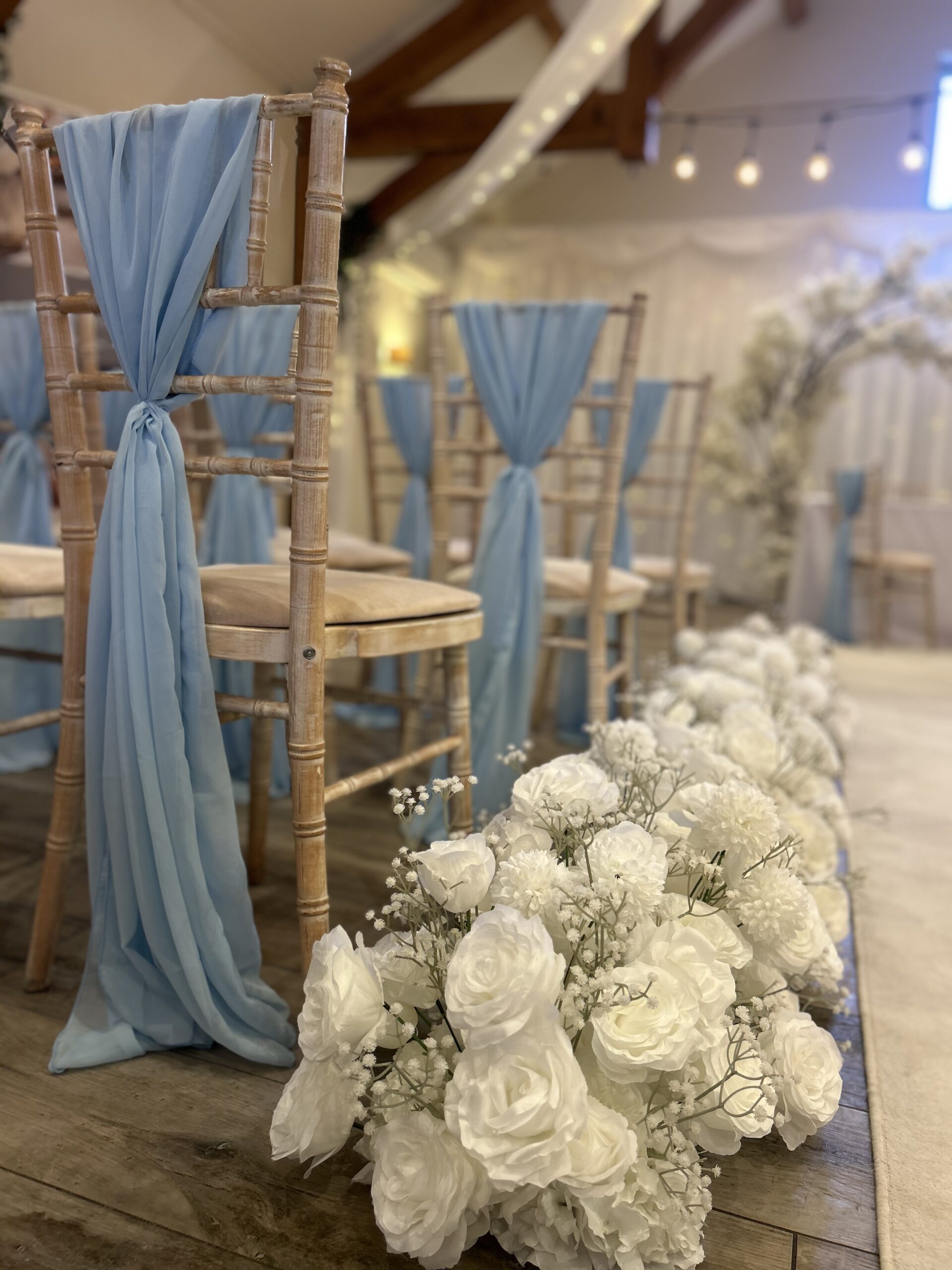 Chair with blue sash